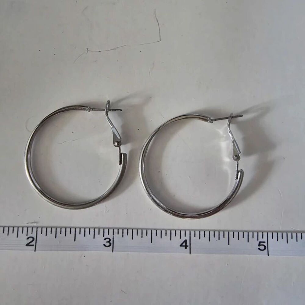 Silver colored hoop earrings